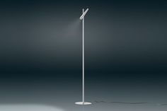 a white floor lamp on a gray background