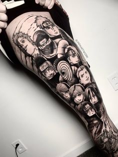 a man's leg with an image of many people on it and the words, one