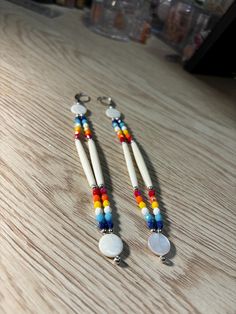 5.25" Mother of pearl/Hairbone earrings made with fire polish beads Mother Of Pearl, Halloween Shopping, Jewelry Earrings Dangle, Beading, Etsy Earrings, Beauty Book, Dangle Drop Earrings, Shells, Dangle Earrings