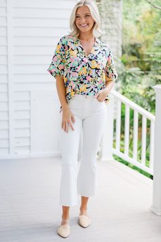 This bold top is so much fun! We absolutely love that vibrant, colorful floral print! The oversized, light fit is also perfect for the warm summer months! This top is going to look fab with white shorts or even white linen pants. V-neckline Short sleeves Paisley print Oversized fit No stretch Payton is wearing the small. Summer Brunch Tops With Relaxed Fit, Summer Relaxed Fit Tops For Brunch, Spring Brunch Tops With Vibrant Print, Casual V-neck Blouse With Bold Print, White Tops With Vibrant Spring Print, White Top With Vibrant Spring Print, White Tops With Vibrant Print For Spring, Spring Short Sleeve Blouse With Bold Print, Multicolor Print Summer Tops For Brunch