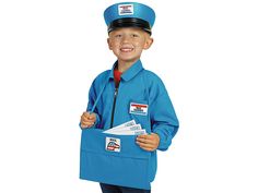 a young boy dressed in a blue police uniform holding mail and smiling at the camera