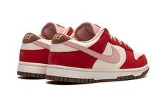 The Women’s Nike Dunk Low “Bacon” is a women’s-exclusive colorway of the retro basketball shoe inspired by the classic Nike Air Max 90 of the same name.  Designed in a similar color scheme to its predecessor, the Dave Ortiz-designed Air Max 90 “Bacon,” the Dunk Low “Bacon” features a Sail leather base with Sport Red suede overlays, and a Sheen Pink leather Swoosh.  The pink hue can also be seen on the mesh tongue.  Brown accenting is found on the “Nike” and Swoosh branded leather tongue tag and Air Max 90 Bacon, Unique Shoe, Sneakers Box, Kobe Shoes, Retro Basketball Shoes, Sneaker Release, Jordan 5, Unique Shoes, Jordan 3