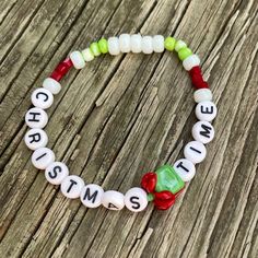 Spice up a Christmas celebration with this beaded bracelet. It can be customized with different letter beads and charms. You do you boo! Necklace can be made with elastic string or flexible wire with lobster or toggle clasps. ❗️Be sure to know your wrist size before placing an order❗️ Let me know if you have any questions! 💕 Novelty White Stretch Bracelet As Gift, White Letter Beads Bracelets For Holidays, Themed White Charm Bracelet Gift, White Beaded Bracelets With Letter Beads For Christmas, Personalized Adjustable Beaded Bracelets For Christmas, Adjustable Stretch Bracelet Gift For Christmas, Personalized White Christmas Bracelet, Adjustable White Stretch Bracelet For Holidays, Themed White Beaded Bracelets Gift