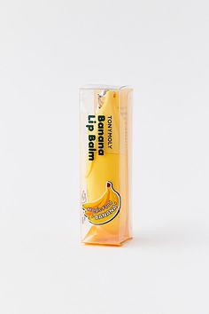 A delish-scented lip balm from TONYMOLY, this banana keychain lip balm offers nutrition and moisture to treat dry and fatigued lips. Features TONYMOLY Magic Food Dalcom Banana Keychain Lip Balm Banana-scented lip balm bag charm Nourishing lip balm helps treat dry & fatigued lips Attach it to your backpack or purse to keep your lips nourished all day! Perfect for gifting Content + Care Ingredients: Petrolatum, Polybutene, Silica Silylate, VP/Hexadecene Copolymer, Diisostearyl Malate, Tocopheryl A Banana Keychain, Magic Food, Scented Lip Balm, Banana Fruit, Premium Skincare, Milk Protein, Tony Moly, Cosmetics Brands, Your Lips