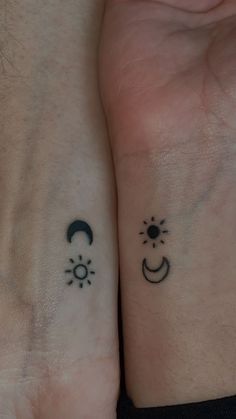 two people with matching tattoos on their arms and wrist, both have sun and moon designs