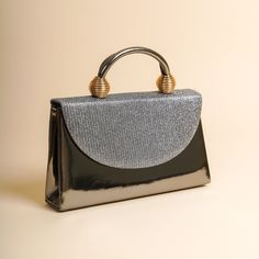 The sides and chain strap of this wedding clutch bag made of faux leather and glitter fabric are silver colored. Basic make-up supplies, cell phone, key chain, credit card and money can easily fit into this luxury mini bag. The interior of this evening bag has a single compartment and is lined with suede. It has a 120 cm removable chain strap. This wedding clutch is completely handmade. Features: Faux leather and glitter fabric. Fits basic makeup, cell phone, key chain, credit card and money. Su Luxury Mini Bag, Wedding Clutch Bag, Evening Clutches, Clutch Bag Wedding, Basic Makeup, Wedding Clutch, Glitter Fabric, Evening Clutch, Party Bag