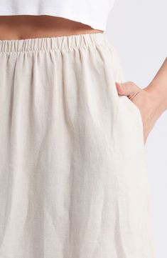 Fashioned with an easy elastic waist and handy pockets, this lightweight skirt made from airy linen is a warm-weather essential. 33" length Elastic waist Side-seam pockets 100% linen Machine wash, tumble dry Imported Relaxed Linen Maxi Skirt For Vacation, Relaxed Linen Skirt For Beach, Linen Lined Skirt For Vacation, Vacation Linen Skirt With Elastic Waistband, Beach Linen Skirt With Pockets, Linen Skirt For Beach, Linen Skirt For The Beach, Beach Linen Skirt With Elastic Waistband, Relaxed Summer Skirt With Slip Pockets