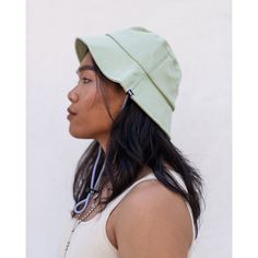 Introducing our versatile and nifty bucket hat, designed to keep you cool and protected. Made with a breathable fabric, this hat is the perfect companion for warm weather adventures. Its traditional brim gives sun protection, shielding you from harmful UV rays while adding a touch of style to your outdoor looks. The pull cord keeps your hat secure while adventuring, park lounging, or outdoor brunching. Available in 3 summer perfect colors for all ages and genders. Your ultimate companion for out Casual Adjustable Wide Brim Bucket Hat, Casual Wide Brim Adjustable Bucket Hat, Casual Wide-brim Adjustable Bucket Hat, Trendy Lightweight Adjustable Bucket Hat, Casual Adjustable Brimmed Bucket Hat, Adjustable Fit Cotton Brimmed Bucket Hat, Adjustable Casual Bucket Hat With Curved Brim, Casual Adjustable Bucket Hat With Curved Brim, Casual Brimmed Bucket Hat For Outdoor Activities