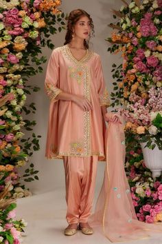 Peachy pink angrakha featuring gota and resham work. Paired with a salwar and a sheer dupatta. - Aza Fashions Pink Silk Sets With Dori Work, Pink Raw Silk Sharara With Gota Work, Pink Raw Silk Sharara With Dabka Work, Pink Raw Silk Palazzo Set With Straight Kurta, Peach Raw Silk Traditional Wear With Resham Embroidery, Pink Resham Embroidery Palazzo Set In Raw Silk, Peach Traditional Wear In Raw Silk With Resham Embroidery, Peach Resham Embroidered Raw Silk Traditional Wear, Pink Traditional Wear With Gota Work For Designer Occasions