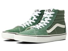 Vans SK8-Hi - Skate Shoes : Color Theory Duck Green : Keep it old school every step of the way with the classic Vans SK8-Hi skateboard shoes! High-top skate shoes with a classic silhouette and Sidestrap detail. Uppers of suede, leather, or canvas. Cotton drill lining. Padded collar for added comfort and support. Triple-stitch collar adorns collar. Die-cut EVA insert. Vulcanized construction: • Slimmed-down profile offers a flexible feel. • Gum rubber outsole with signature waffle tread provides Casual Suede Lace-up Skate Shoes, Casual Leather Canvas Shoes For Streetwear, Classic Lace-up High-top Sneakers For Skateboarding, Casual Skate Shoes With Rubber Sole For Streetwear, Green Casual Skate Shoes For Streetwear, Green Vulcanized Sole Skate Shoes, Casual Green Skate Shoes For Streetwear, Green Skate Shoes With Speckled Midsole, Classic Suede Skate Shoes With Round Toe