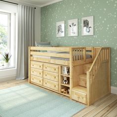 a child's bedroom with green wallpaper and wooden stairs leading to the loft bed