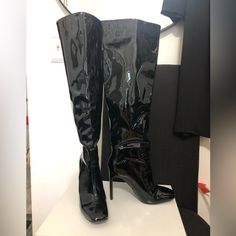 Black Patent Leather Over The Knee Boots. Sz 9. Good For Fall, Cosplay, Halloween. Tried On But Never Worn. Some Scuffs That Are Barely Noticeable. See Last Photo. Edgy Fitted Boots For Cosplay, Fitted Thigh High Patent Leather Boots, Gothic Black Boots For Club, Fitted Punk Boots In Faux Leather, Black Thigh High Polyurethane Heeled Boots, Gothic Party Heeled Boots In Faux Leather, Gothic Faux Leather Heeled Boots For Party, Black Fitted Punk Boots, Punk Style Fitted Faux Leather Boots