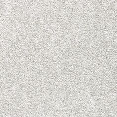 a white stucco wall textured with cement