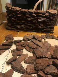 a pile of rocks sitting on top of a wooden table