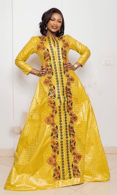 Description: This magnificent custom African dress is perfect for any occasion you want to look your best. It includes 3 pieces (Full dress, wrap-around or Skirt and head-tie).   Important Note: For broderie mix with bazin and garniture mix clothes only: Depending on the availability of the( fabric) / Garnitures (TRIMS) may be different than the one in the pictured. However, the dress will be sewn exactly in the style and colors shown. You can always request to see the fabrics or trims before we Traditional Yellow Dress For Celebration, Traditional Long Sleeve Yellow Gown, Elegant Long Sleeve Yellow Gown, Festive Yellow Party Kaftan, Formal Yellow Maxi Dress With Long Sleeves, Yellow Long Sleeve Maxi Dress For Formal Occasions, Yellow Long Sleeve Kaftan For Wedding, Yellow Long Sleeve Party Gown, Gold Long Sleeve Festive Dress