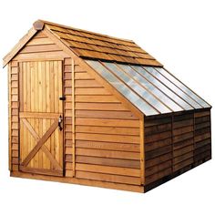 a wooden shed with a glass roof and doors on the side, in front of a white background