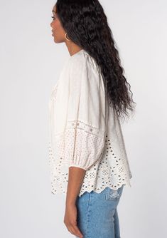 Intricate embroidery adds a handcrafted feel to this cotton bohemian peasant top. Designed in a textured dobby and dot print, this classic style features a split neckline with tassel tie accents and a delicate pleated bib detail. Sheer lace inserts add a pretty touch to the long voluminous sleeves. Dobby & dot print Embroidered Relaxed fit Voluminous 3/4 length long sleeve Elastic wrist cuff Split v-neckline with tassel ties Lace trim Pleated bib Cotton top Flowy bohemian peasant top Model is 5' White Bohemian, Voluminous Sleeves, I Choose You, Bohemian Tops, Intricate Embroidery, Embroidery Lace, Wrist Cuffs, Lace Insert, Peasant Top