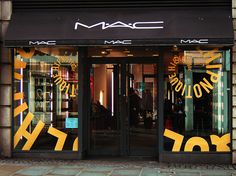 a store front with the words mac written on it