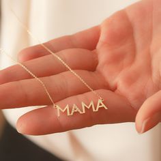 14K Solid Gold Diamond Mama Necklace, Cz Zircon Mama Necklace, Dainty Delicate Plain Gold Mama Necklace is a Great Mother's day Gift for Mom. Material: Solid Gold (no gold filled or no gold plated material) Karat: 14 K (585) Mama Pendant Height: 7 mm (0.28 inches) Mama Pendant Width: 2.5 - 2.60 cm (0.98 - 1.02 inches) Measurements may vary due to handwork. Diamond Mom Necklace >> Diamond Weight: 0,06 - 0,08 ct >> Number of diamonds: 10 >> Diamond Color: G - H color >> Dia Mother's Day Cubic Zirconia Necklace Gift For Her, Mother's Day Gift Cubic Zirconia Necklace, Cubic Zirconia Necklace For Mother's Day, Personalized Cubic Zirconia Necklace For Mom, Personalized Diamond Jewelry Gift For Her, Personalized Diamond Jewelry As A Gift For Her, Personalized Cubic Zirconia Necklace For Mother's Day, Mother's Day Anniversary Cubic Zirconia Necklaces, Cubic Zirconia Necklaces For Anniversary Mother's Day