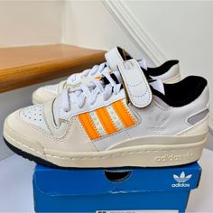 Brand New With Tags And Box , Never Worn . Adidas Forum 84 Low Women’s Sneakers In Orange Rush / Off White / Purple Tint. Size Women’s 5 Msrp $100 + Tax. Price Is Firm. “The B-Ball Status Shoe, In Low Top Form. More Than Just A Shoe, It's A Statement. The Adidas Forum Hit The Scene In '84 And Gained Major Love On Both The Hardwood And In The Music Biz. This Pair Of The Classic Shoes Brings Back The '80s Attitude, The Explosive Hardwood Energy And The Iconic Removable Strap Ankle Design, Distille Orange Low-top Skate Shoes With Laces, Orange Round Toe Skate Shoes With Laces, Sporty Orange Lace-up Skate Shoes, Orange Adidas Sneakers For Streetwear, Orange Adidas Logo Sneakers For Streetwear, Adidas Orange Sneakers With Branded Insole, Orange Low-top Sporty Skate Shoes, Orange Adidas Sneakers With Logo, Sporty Orange Adidas Sneakers