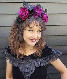 Lovely hot pink silk roses and a single dusty-pink silk dahlia, surrounded by prickly black foliage and glittery black leaves, while a single black butterfly rests on top. What a lovely headdress to welcome fall! This headdress is handmade. There are combs to help keep it in place. Pink Costume Hats And Headpieces For Halloween, Pink Halloween Costume Accessories, Pink Halloween Costume Hats And Headpieces, Fitted Pink Halloween Costume Accessories, Gothic Tiara, Hot Pink Silk, Gothic Crown, Gothic Bride, Wicker Man