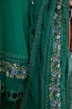 Bottle Green Embroidered Pakistani Salwar Kameez Dupatta Salwar Suit is a stunning dress to wear on a festive occasion. This beautiful Salwar Kameez is emblazoned with embroidery, floral designs, motifs, gotta, and mirror details, making it an epitome of beauty and grace. Embroidered Kameez: The kameez has a beautiful blend of green colors. The premium fabric and hand-crafted details of embroidery make it a chic choice for the big day. Mirror details on the neckline and gota details give a tradi Festive Unstitched Anarkali Set With Resham Embroidery, Designer Anarkali Set With Intricate Embroidery, Dola Silk Anarkali Set With Intricate Embroidery, Festive Anarkali Kurta With Intricate Embroidery, Pista Green Anarkali Set With Intricate Embroidery For Eid, Designer Sharara With Intricate Embroidery And Straight Kurta, Festive Chinon Salwar Kameez With Intricate Embroidery, Festive Unstitched Anarkali Set With Intricate Embroidery, Festive Chanderi Anarkali Set With Intricate Embroidery