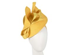 Large yellow twisted plate decorated with silk abaca bow. Hand made in Melbourne by our skillful milliners, this headpiece will be a crown jewel of your spring racing outfit.   Made in Australia  Exclusive materials  Stylish design by Fillies Collection  Comfortable headband Luxury Yellow Hat Fascinator, Yellow Hair Accessories For Summer Party, Yellow Headband For Spring Party, Yellow Headband For Summer Wedding, Yellow Summer Wedding Headband, Spring Party Hair Accessories With Decorative Bow, Elegant Spring Headpiece With Ribbon, Summer Formal Fascinator With Ribbon, Elegant Spring Hair Accessories With Decorative Bow