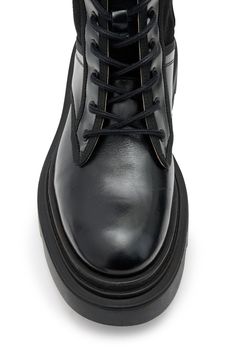 Take your off-duty style to the next level with this leather-and-suede lace-up boot grounded by a sturdy lug sole. 2 1/4" heel; 1 1/2" platform 9 1/4" shaft Lace-up style; side zip closure Leather upper and lining/synthetic sole Made in Portugal Platform Lace-up Workwear Boots, Leather Lace-up Boots With Reinforced Heel For Work, Workwear Lace-up Boots With Leather Sole, Fall High-top Lace-up Boots With Vibram Sole, High-top Platform Boots With Leather Sole For Streetwear, Leather Lace-up Platform Boots, Leather Platform Lace-up Boots For Streetwear, Leather High Ankle Platform Boots With Vibram Sole, High Ankle Leather Platform Boots With Vibram Sole