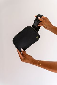 Our Shae Crossbody Bag is a perfect, lightweight bag to carry your everyday items, such as a phone, keys, chapstick, and cards! It measures 7" w x7.5" w x 5"x1/75" d. Available in black and cream. Brand: Modern + Chic Black Pouch Belt Bag, Functional Black Crossbody Phone Bag, Black Phone Bag For On-the-go, Portable Black Travel Pouch, Black Functional Phone Bag For Travel, Functional Black Phone Bag For Travel, Functional Black Portable Pouch, Black Travel Pouch For Everyday Use, Black Travel Accessories Pouch For Everyday Use