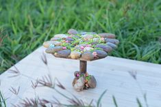 there is a small table made out of rocks and stones on top of each other