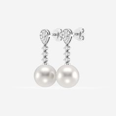 Exude elegance down to the last drop with these pearl and diamond mini drop earrings. The sophisticated design features dazzling lab grown diamond-encrusted studs connected to lustrous pearls by a smaller strand of mini pearls. Add a ladylike gleam to your going out or special occasion looks with these stunning diamond and pearl mini drop earrings. Pear-shaped Diamond Earrings For Formal Events, Diamond Pearl Earrings In White Gold, Pear Shaped, White Gold Diamond Pear Shaped Pearl Earrings, Luxury Diamond Earrings With Pearl Drop, Luxury Diamond White Diamond Earrings With Pearl Drop, Formal Diamond Pearl Earrings With Brilliant Cut, Timeless Pear-shaped Diamond Earrings In White Gold, Formal Brilliant Cut Diamond Pearl Earrings, Elegant White Diamond Clip-on Earrings