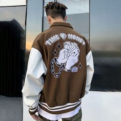 Spruce up your looks by adding the Time is Money varsity jacket to your wardrobe. This unisex brown letterman jacket has a relaxed fit with embroidery on the front and back. Hip Hop Street Fashion, Hip Hop Fashion 90s, Streetwear Jackets, Streetwear Mode, Varsity Jacket Men, Baseball Varsity Jacket, Leather Sleeves, Winter Stil, Letterman Jacket