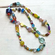 One Of A Kind Handmade Glass Bead Necklace With Vintage Y2k + 90s Beads Featuring: Vintage, Y2k/90s + Modern Beads Glass, Wood, Clay, Vinyl/Acrylic, Ceramic Curated Blend Of Small + Med-Small Beads Chunk Scale Of 1 To 5: 2.5 Fine Quality Knotted Durable High Tenacity Nylon Cord 13” Drop Length 26” Total Length Brand: Www.Karlymortensen.Com Vintage + New Materials Handmade In Denver, Colorado Ready To Ship Shop My Boutique For All Handmade Artist Items From My Studio Diy Glass Bead Jewelry, Y2k Bead Necklace, Chunky Glass Bead Necklace, Handmade Colorful Glass Beaded Necklaces, Colorful Handmade Glass Beaded Necklaces, Handmade Yellow Glass Beaded Necklace, Fun Handmade Necklaces For Everyday, Fun Handmade Everyday Necklaces, Fun Everyday Handmade Necklaces