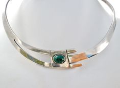 Mexican Jewelry - This is a sterling silver collar necklace with a green malachite gemstone. It is hallmarked 925 Mexico with additional marks, .75" wide, gem is 10mm by 8mm, inside circumference is 11.75", opening is 3..25", weight is 45 grams. Mexican Jewelry, Green Malachite, Green Necklace, Collar Necklace, Cuff Bracelets, Gems, Collar, Sterling Silver, Gemstones