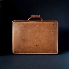 Hartmann belting leather hard briefcase / attache case. From the brand known for excellence in quality: beautifully stitched caramel leather case and straps. Some solid brass and brass tone:  combination lock, corner braces, release  levers, hardware and snaps.  Four bakelite feet are intact. All hardware functions well. Two inner compartments, one for accessories and papers, the other closes with a flap.  It's a beauty! Outer dimensions: Length: 18" Width: 13 1/2" Height: 5" Weight: 7lb 15oz Condition: scuff marks, faint water spots and stains, patina from  age and wear.  Interior has ink marks from printed papers. Otherwise clean, no musty odor. Please see all photos as they are part of the description. Feel free to inquire with any questions before purchase. I do my absolute best to des Cognac Rectangular Briefcase For Formal Occasions, Formal Cognac Rectangular Briefcase, Formal Rectangular Cognac Briefcase, Classic Cognac Rectangular Cases, Classic Cognac Rectangular Case, Vintage Leather Case For Business Trips, Vintage Leather Cases For Business Trips, Vintage Brown Rectangular Briefcase For Formal Use, Classic Vintage Brown Rectangular Briefcase