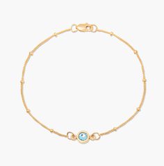 With a minimalist splash of color, our dainty Jules Birthstone Bracelet is an easy way to glam up any trendy outfit. This gold bracelet features a bezel cut birthstone available in twelve colors. Available in sterling silver or 24k gold vermeil Bezel pendant size: 1/4" Custom 4 millimeter crystal 6 1/2" satellite chain Lobster claw closure Made in the USA SHIPPING NOTE ﻿- This custom item takes 10 business days to produce from the order date SKU: BYB1146 Yellow Gold May Birthstone Bracelets, Sterling Silver Yellow Gold Bracelets With Birthstone, Yellow Gold Sterling Silver Bracelets With Birthstone, Yellow Gold May Birthstone Bracelet, Diamond Bracelet With Gemstone Accents As A Gift, Elegant Gold Bracelet With Birthstone For Everyday, Yellow Gold Birthstone Chain Bracelet, Elegant Everyday Gold Bracelet With Birthstone, Everyday Fine Jewelry Birthstone Bracelets