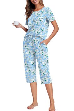 PRICES MAY VARY. Material: Our women's pajama sets are made of comfy and breathable fabric, the 2 piece lounge set provides an exceptional level of comfort. This material is not only comfortable but allows you to relax in the most serene surroundings Unique Design: The casual pajamas set for women with a unique line design on the cuffs and the capri pants. Besides, pockets on either side of the pant make it easy to store small items Pant with Drawstring: The pjs come with an elastic waistband an Comfortable Matching Sleepwear Set For Spring, Comfortable Matching Set Sleepwear For Spring, Blue Short Sleeve Matching Sleepwear Set, Soft Pjs, 2 Piece Lounge Set, Casual Pajamas, Pjs Set, Womens Pajama, Womens Pajamas