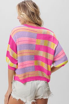 The Multi Color Striped Round Neck Knit Top is a vibrant and versatile piece that will add a pop of color to your wardrobe. Featuring a variety of hues in a striped pattern, this knit top offers a fun and playful look. The round neckline provides a classic and flattering silhouette that can be easily styled for different occasions. Pair it with jeans for a casual and colorful outfit, or dress it up with a skirt and heels for a more polished ensemble. The mix of colors adds a dynamic and eye-catc Spring Color Block Knit Top, Color Block Knit Top For Spring, Spring Knit Color Block Top, Summer Color Block Knit Sweater, Trendy Color Block Knit Top, Trendy Multicolor Crew Neck Knit Top, Pink Oversized Top For Fall, Oversized Pink Top For Fall, Oversized Pink Tops For Fall