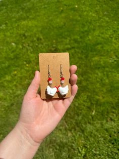 Did someone say, Chickens? These super cute earrings are paired with tiny little chickens and accessorized with red and white glass beads. Cute White Beaded Dangle Earrings, White Beaded Earrings As Gift, White Hypoallergenic Beaded Earrings As Gift, Hypoallergenic White Beaded Earrings For Gifts, Hypoallergenic White Beaded Earrings Gift, Cute Earrings, Red And White, Jewelry Earrings Dangle, Glass Beads