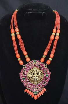 Luxurious laxmi Temple pendent with real coral mala.product-temple jewellery pendentfinish-antiquebeads-coral(munga,pagdam) Red Round Beads Temple Necklace, Red Temple Jewelry Necklace With Round Beads, Red Temple Necklace With Round Beads, Red Temple Necklace For Puja And Festivals, Red Temple Jewelry Beaded Necklaces For Festivals, Red Temple Jewelry Beaded Necklace For Festivals, Traditional Red Beaded Necklaces For Puja, Traditional Red Beaded Necklace For Puja, Temple Necklace With Locket For Festivals