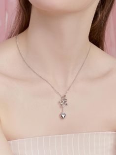 Composition : brassColor : silver,goldCountry of Origin : KOREA Coquette Jewelry, Ribbon Heart, Accessories Jewelry Necklace, Women Accessories Jewelry, Heart Necklace, Jewelry Accessories, Fashion Inspo, Jewelry Necklaces, Composition