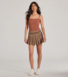 This plaid mini skirt is totally trending this season! It features a high-rise waist with a skinny belt accent for preppy style, an A-line silhouette, and a pleated mini-length hem. Complete the look in a basic top for any casual plans.Fit & FeaturesPlaid printed woven fabric, woven liningHigh-rise waist with beltSide zipper with hook-eye closureA-line silhouettePleated mini-length hemRuns true to size Trendy Mini Tennis Skirt For Fall, Trendy Lined Tennis Skirt For Fall, Trendy Short Tennis Skirt For Fall, Preppy Short Mini Skirt For Fall, Trendy Short Pleated Skirt For Fall, Trendy Fitted Plaid Tennis Skirt, Preppy Lined Tennis Skirt For Fall, Trendy Pleated Tennis Skirt For Fall, Fall Preppy Lined Tennis Skirt