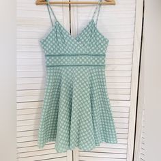 This Beautiful Mint Green Dress From Trixxi Clothing Company Features White Embroidered Flowers And A Flattering Fit & Flare Style. The Dress Is Fully Lined, Has A V-Neckline And Is Sleeveless, And A Short Length Of 30". It Is Made Of 100% Cotton With A Chambray Feel And Embroidered Floral Design. Perfect For Any Occasion, This Dress Is Great For Weddings, Parties, Or Casual Outings. It Is Juniors Size Large And Has A Chest Size Of 32". The Dress Is Easy To Care For And Comfortable To Wear, Spag Cotton V-neck Mini Dress Lined, Lined Cotton V-neck Mini Dress, Cotton V-neck Lined Sundress, V-neck Cotton Sundress With Lace Trim, Cotton V-neck Sundress With Lace Trim, Spring Lace Fit And Flare Mini Dress, Summer Lace Fit And Flare Dress, Summer Cotton Fit And Flare Dress, Summer Fit And Flare Dress With Lace Trim