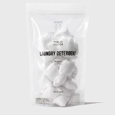 a bag of laundry deterant sitting on top of a white table