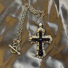 No Brand Purple Cross Necklace Purple Rhinestones & Silver Looks Brand New | No Tag| Silver Cross Pendant Jewelry For Party, Silver Cross Jewelry For Party, Silver Sparkling Rhinestone Necklace For Gift, Silver Cross Jewelry With Rhinestones, Silver Cross Jewelry With Bling, Silver Rhinestone Costume Necklace For Gift, Purple Cross, Necklace Purple, Purple Rhinestone