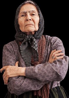 an old woman with her arms crossed