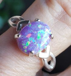 Beautiful Favorite Lavender Purple Fire Opal Ring, 8x10mm Lab Created Opal, Set in 925 Sterling Silver V Shank Ring. Size 5.5,7, 7.5. Great Favorite Gift! Purple Oval Opal Ring For Gift, Oval Purple Opal Ring For Gift, Multicolor Oval Opal Ring In Sterling Silver, Vintage Opal Engagement Ring, Lavender Opal, Purple Opal, Purple Fire, Fire Opal Ring, Engagement Rings Opal