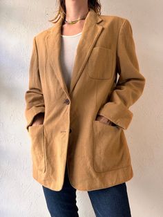 - Vintage Ralph Lauren camel hair blazer jacket - 100% camel hair with silky monogram lining - Padded shoulders - Made in USA - Tagged 12  Chest: 20.5" Waist: 19" Length: 29" Sleeve: 24" Shoulder: 17" Spring Brown Collared Sport Coat, Classic Solid Blazer With Patch Pockets, Classic Brown Blazer For Spring, Classic Brown Spring Blazer, Spring Brown Wool Blazer, Vintage Workwear Blazer With Patch Pockets, Vintage Blazer With Patch Pockets For Work, Brown Wool Button-up Blazer, Vintage Beige Blazer With Pockets