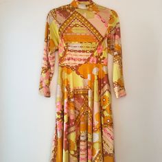 Vintage 1972 Anne Fogarty Disco Design Long Sleeve Fit & Flare Midi Dress Zip Packets No Size On Dress Lying Flat... Chest 14" Waist 12.5" Hips 24" Anne Fogarty, Disco Design, Flare Midi Dress, Flat Chest, Orange Yellow, Fit & Flare, Midi Dress, Womens Dresses, Orange