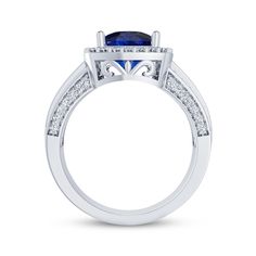 Attract attention with the bold sparkle of this lab-created gemstone ring. Sterling silver Cushion-cut blue lab-created sapphire centerpiece Round-cut white lab-created sapphires on the frame and shank Channel-set square-cut blue lab-created sapphires Classic Trillion Cut Sapphire Ring, Formal Sapphire Halo Ring With Accent Stones, Classic Jewelry With Trillion Cut Center Stone, Cushion Cut Sapphire Ring With Diamond Accent Stones, Trillion Cut Halo Setting Fine Jewelry Rings, Trillion Cut Halo Rings In Fine Jewelry, Trillion Cut Halo Setting Fine Rings, Blue Trillion Cut Ring With Diamond Accents, Blue Trillion Cut Diamond Jewelry